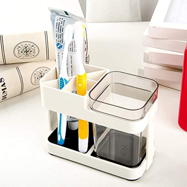Cup toothpaste holder